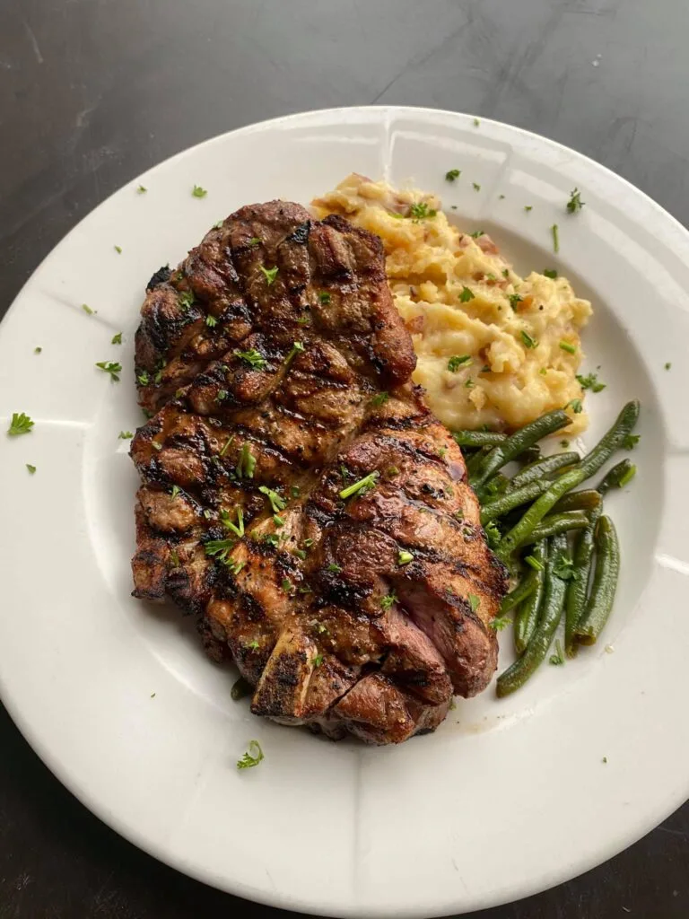 Pork Steak with green beans and potatoes.