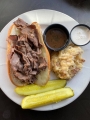French Dip Sandwich with potato at Fat Chad's Brewing.